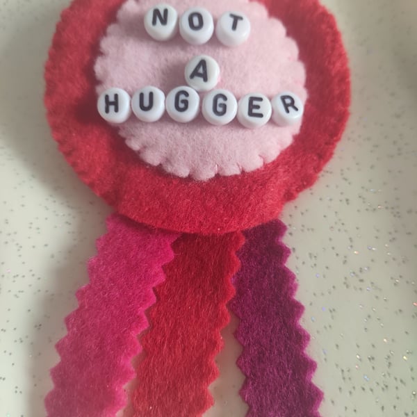 Not a hugger rosette