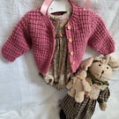 Handmade newborn romper with handknitted cardigan