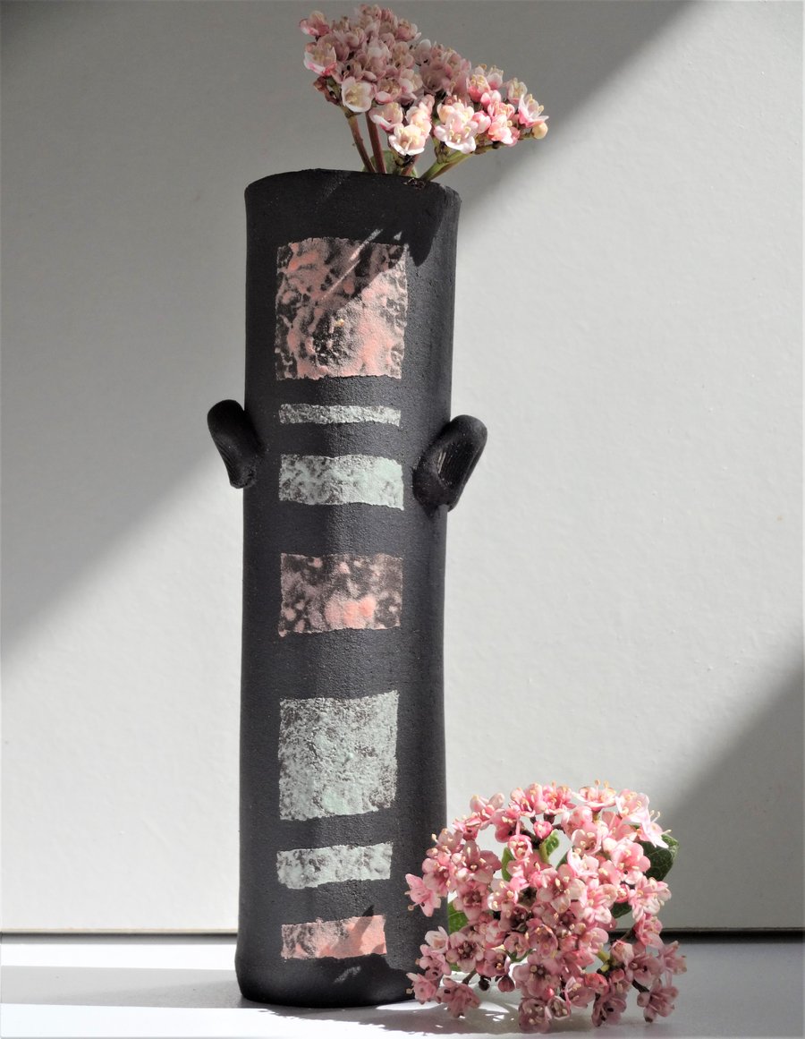 Sergio. Black abstract art ceramic vase with handles and pastel colour bands 