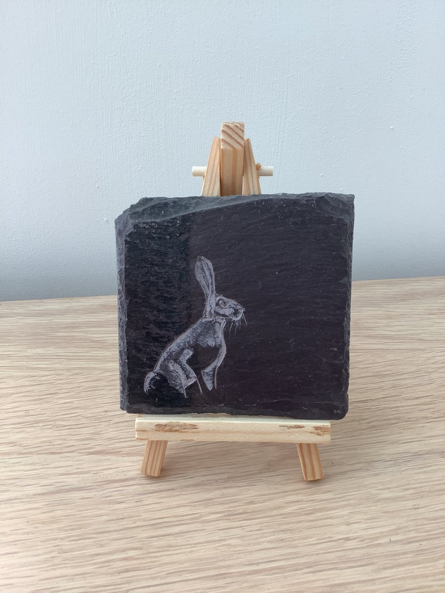 Hare sitting in field - original art hand carved on slate