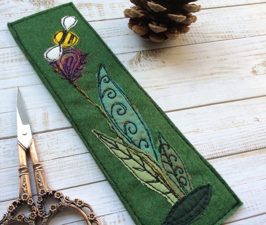 Embroidered bee and flower bookmark. 