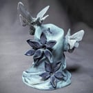 Unlit ii - small, haunting, ethereal moth, flower and candle sculpture