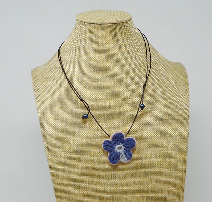 Crochet blossom flower necklace in blue and pink