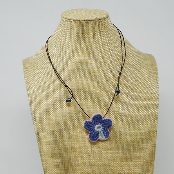 Crochet blossom flower necklace in blue and pink