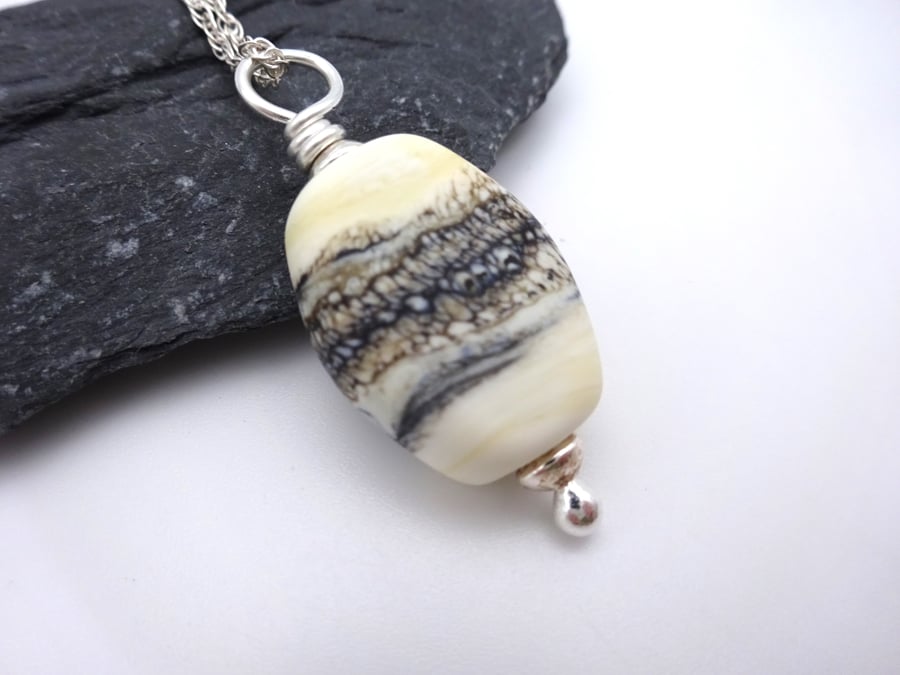 lampwork glass ivory and black beach pendant necklace