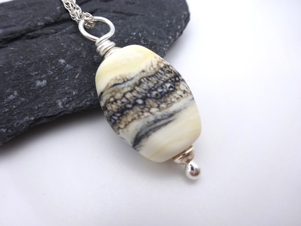 lampwork glass ivory and black beach pendant necklace