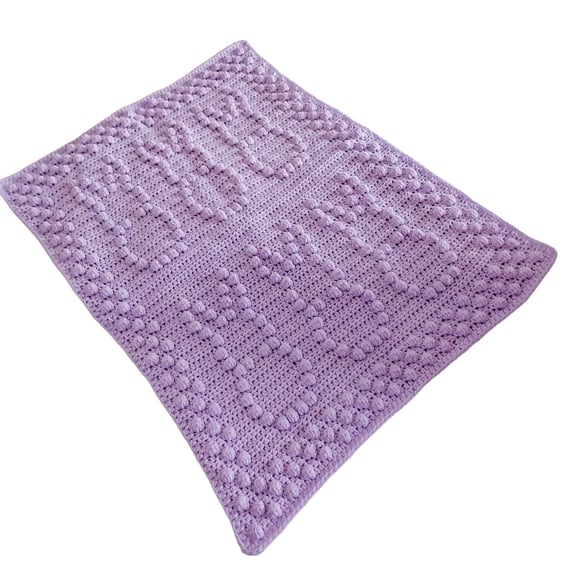 Crochet baby blanket in lilac with puff bobbly bunny pattern