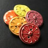 SALE set of five citrus slice ceramic buttons