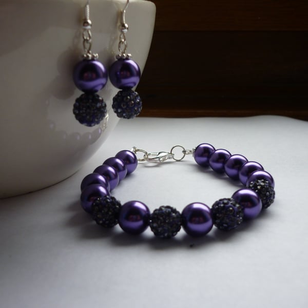 PURPLE AND SILVER, PEAR AND PAVE BEAD BRACELET AND EARRING SET.