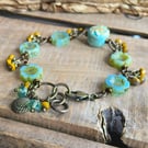 Seafoam Green Czech Glass Bracelet with Artisan Polymer Clay Starfish Bead 