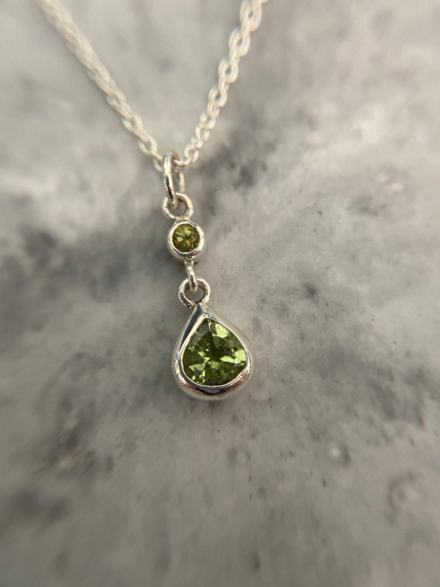 Green tourmaline and green topaz pendant set in silver 