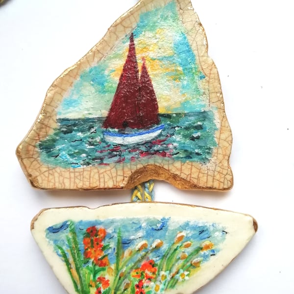 Boat and wallflower pottery hanging