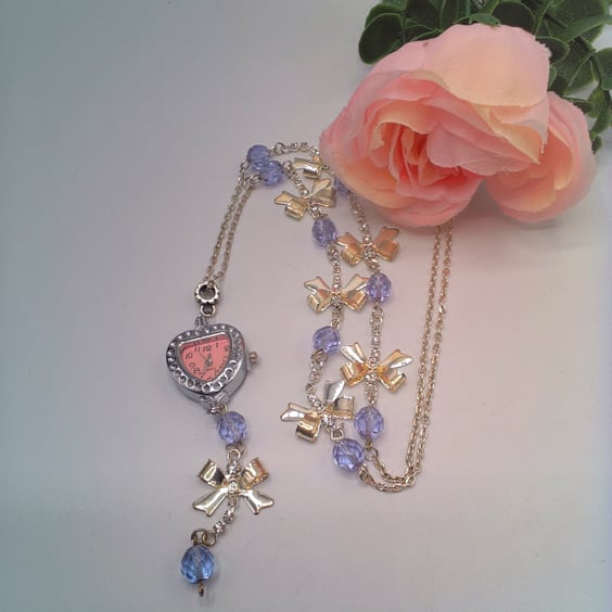 Heart Shaped Fob Watch on a Long Line Chain with Silver Bows and Lilac Crystals