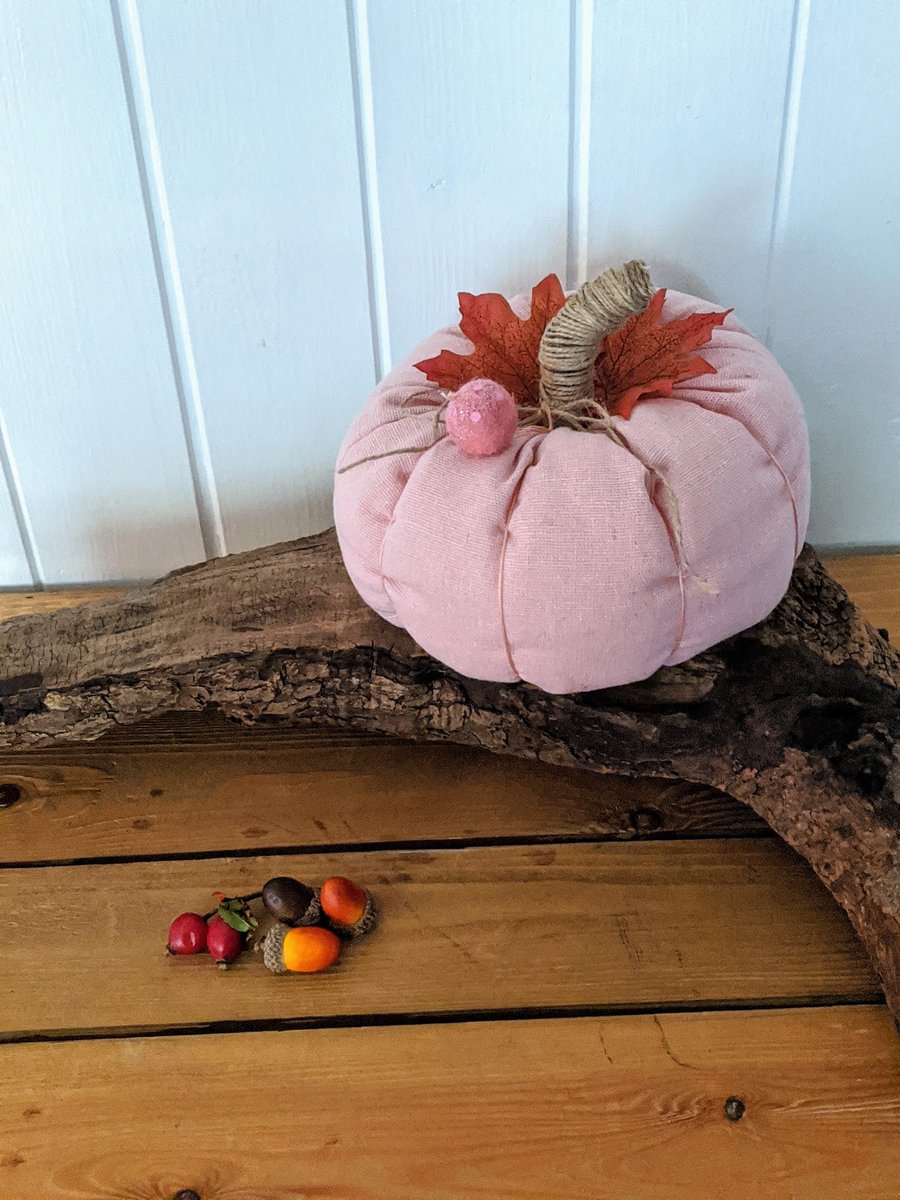 Handmade fabric pumpkin. Halloween decoration. Soft sculpture