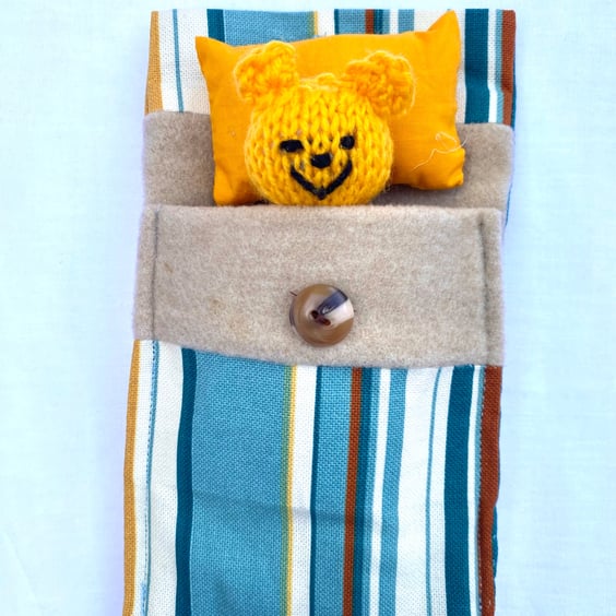 Ted in a bed, cute companion bear 