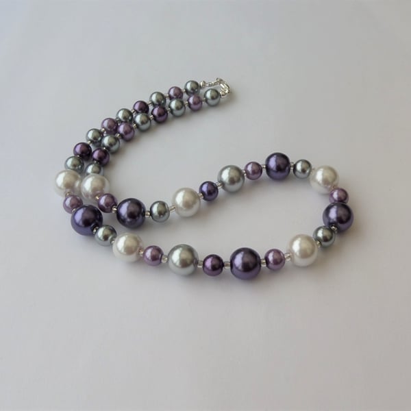 White, silver, grey and purple glass pearl bead necklace. 