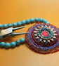 Celtic disk pendant on turquoise bead necklace - Image 2