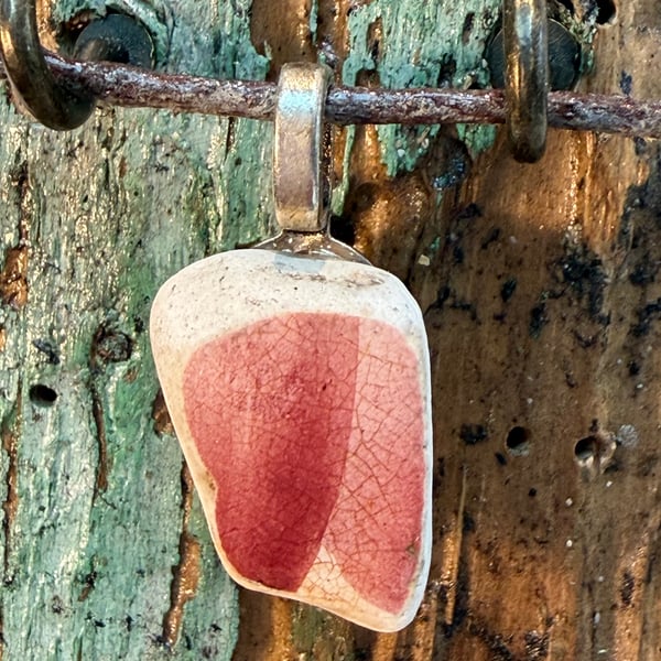 Pretty red pink sea pottery pendant