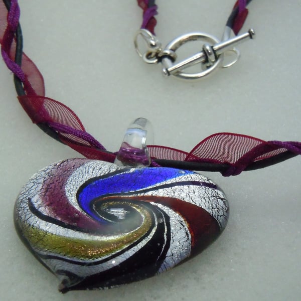 A Murano style foil glass heart pendant