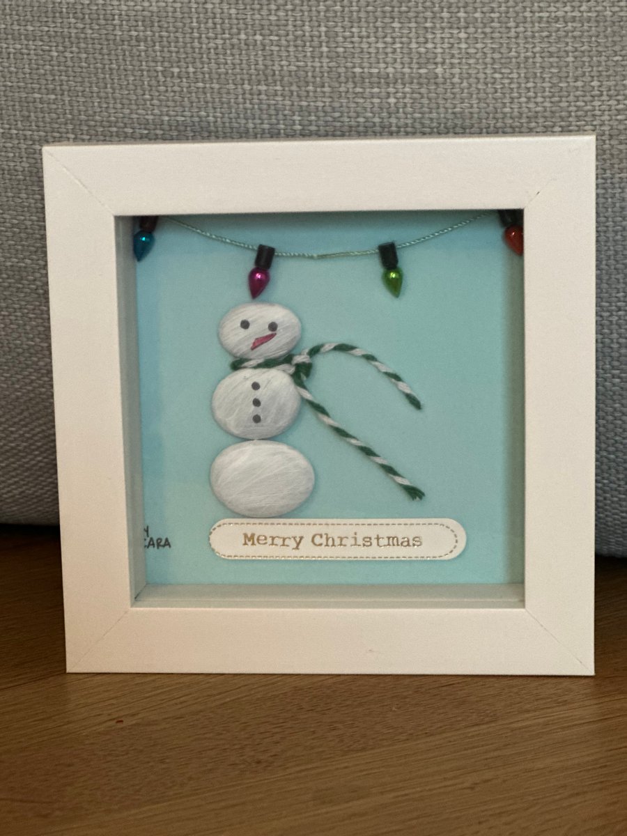 Christmas pebble art of a snowman