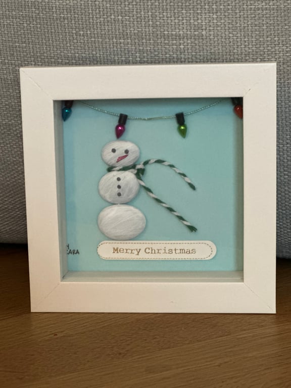 Christmas pebble art of a snowman