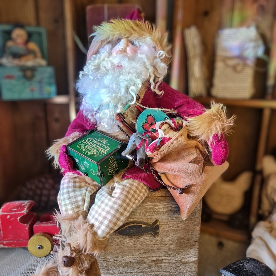 Handmade heirloom sitting father Christmas collectable textile art.