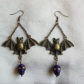 Spooky Antique Bronze Bat Earrings with Purple Skulls.