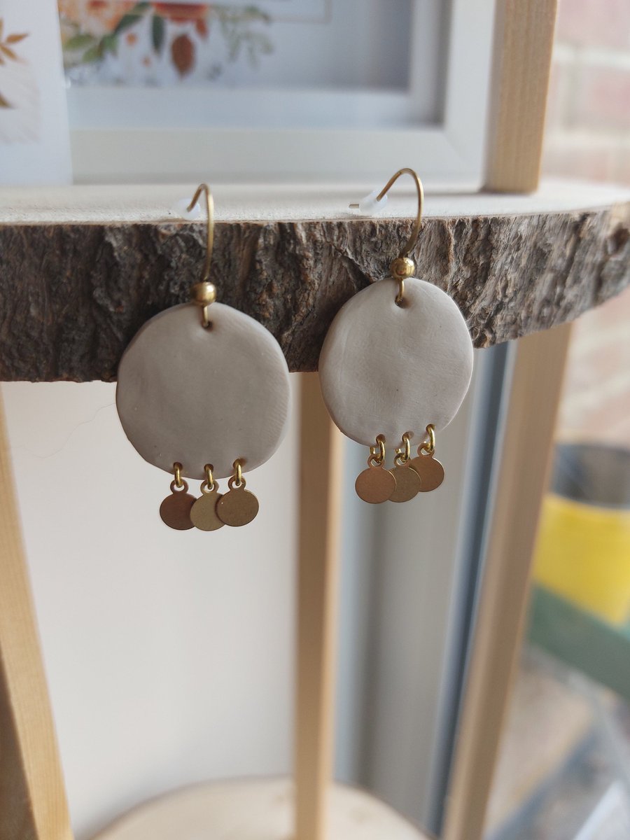 Image of Hand-made clay circular-shaped dangling earrings