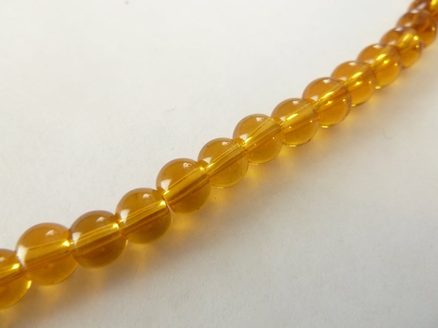 amber 6mm glass beads