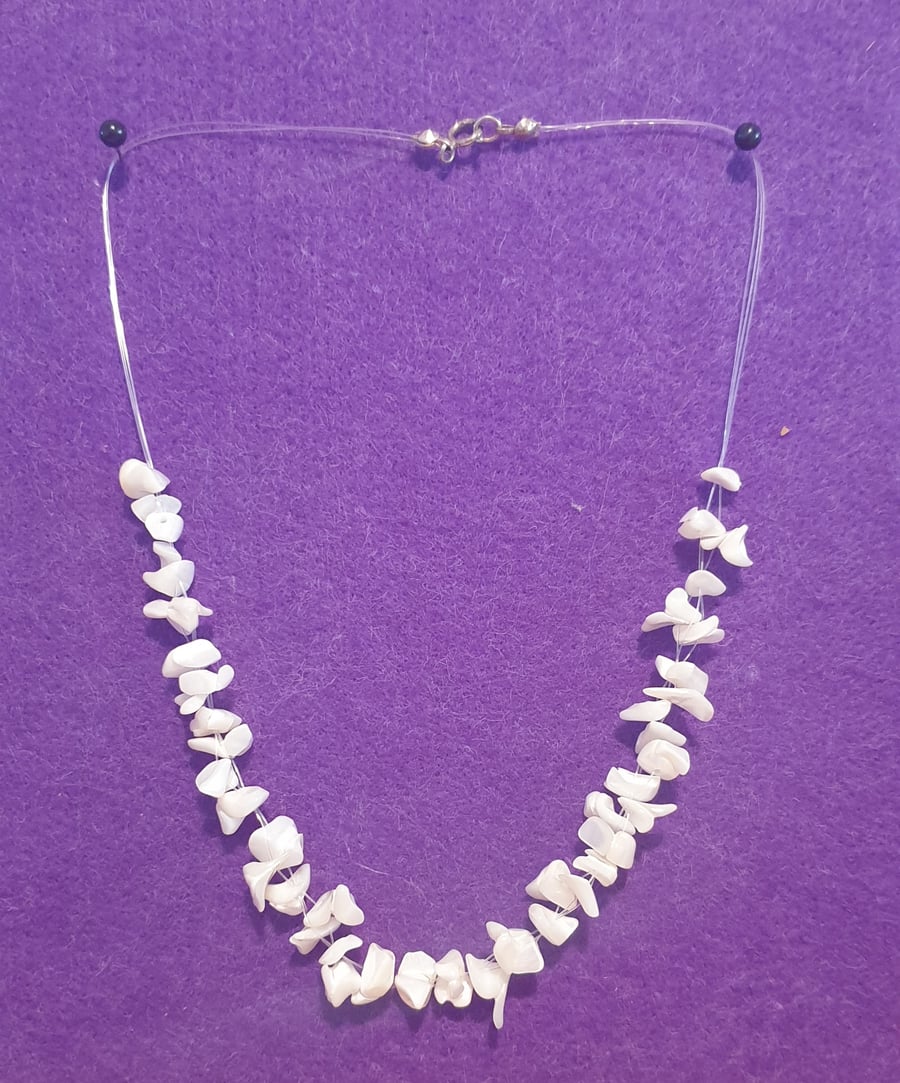 Floating pearl gemstone necklace.