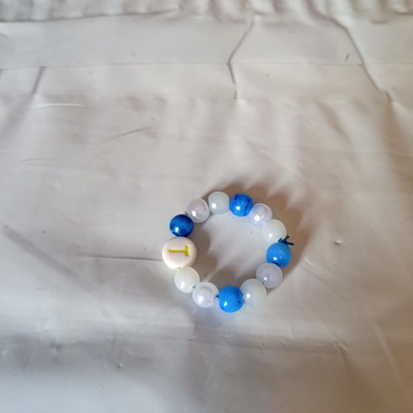 Initial ring with bead