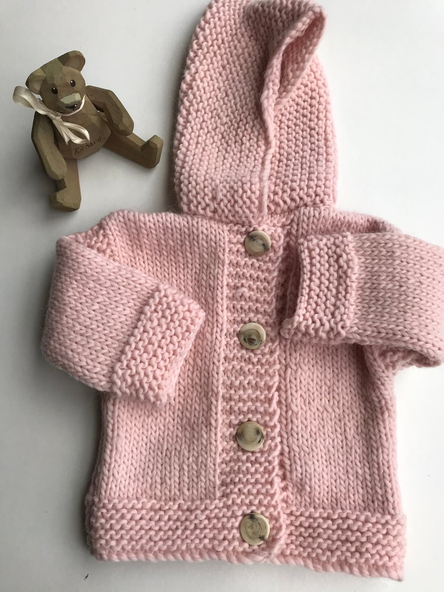 Chunky pink hooded baby jacket