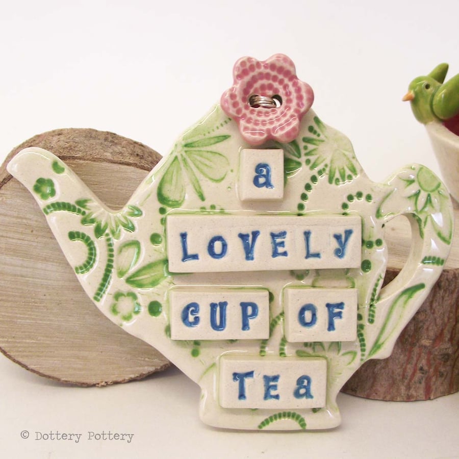 Ceramic teapot decoration with flower button pottery teapot