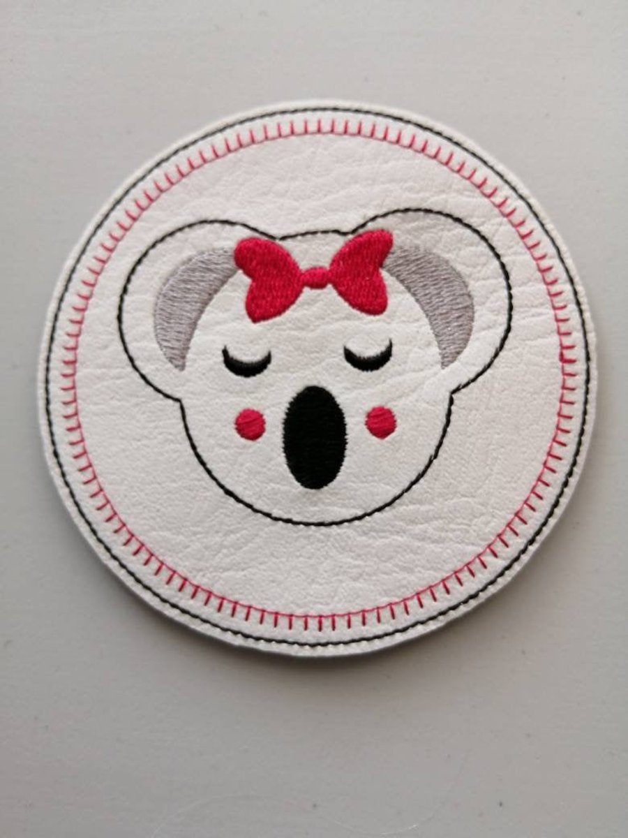 802. Koala with bow coaster.
