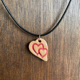 Entwined heart pendant