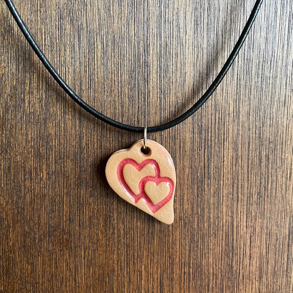 Entwined heart pendant