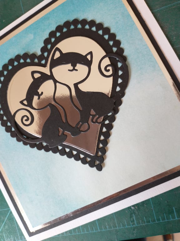 Lovey dovey cats on blue card