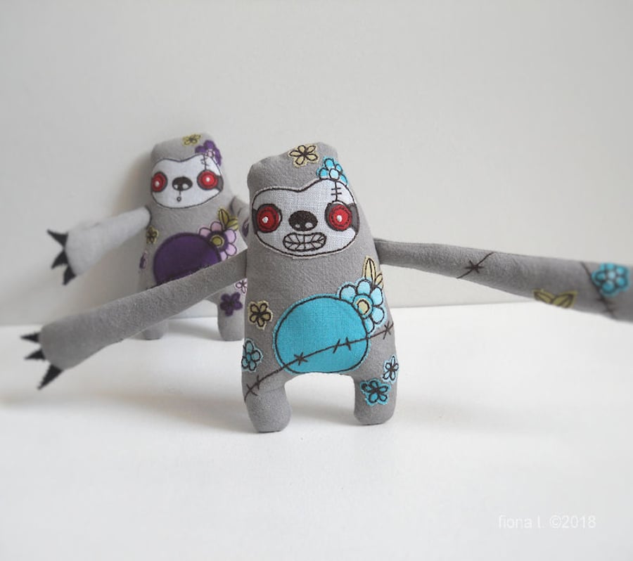 freehand embroidered floral zombie sloth - blue