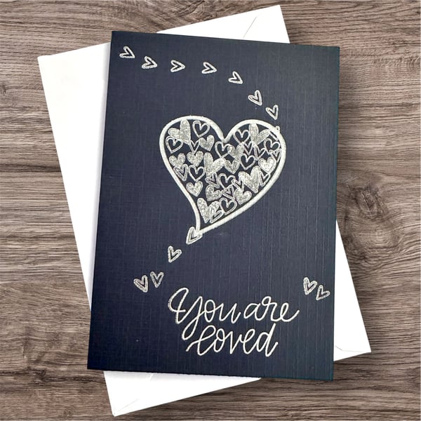 Valentines card, black and silver hearts for him or her, you are loved, unique. 
