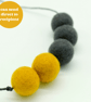 Felted bead necklace in grey and yellow wool - Image 1