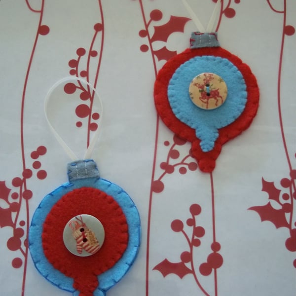 Pair of bauble shaped felt handstitched Christmas decorations