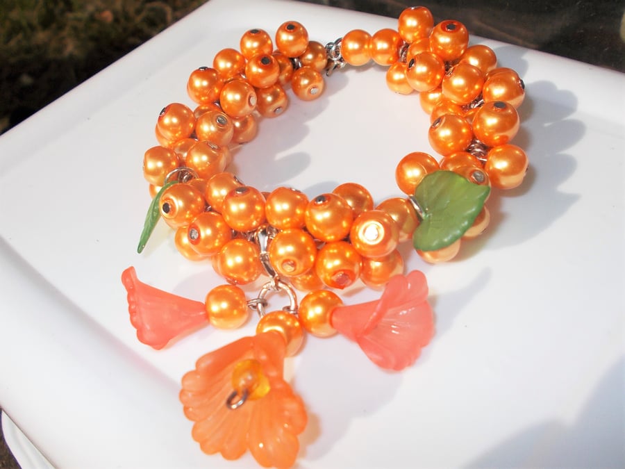 Orange Memory Wire Open Bracelet with Flowers