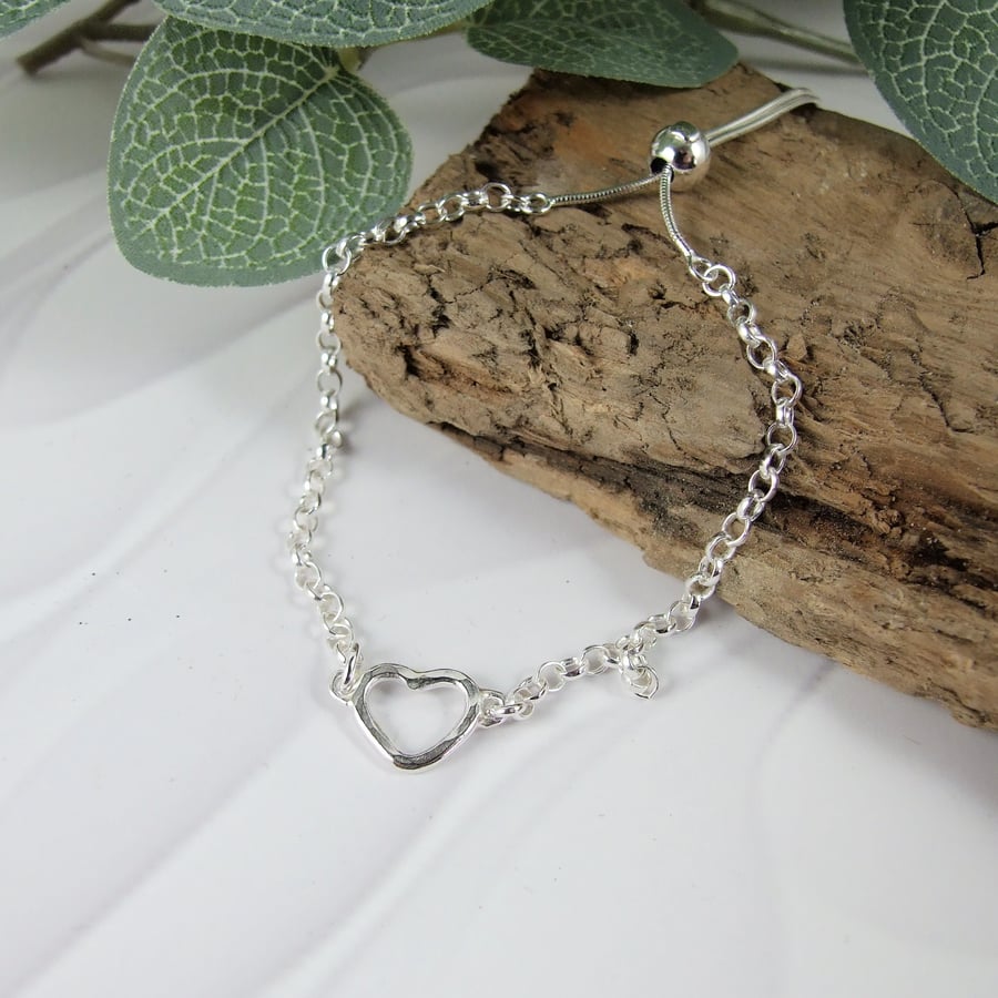 Sterling Silver Bracelet. Adjustable fit with Small Heart