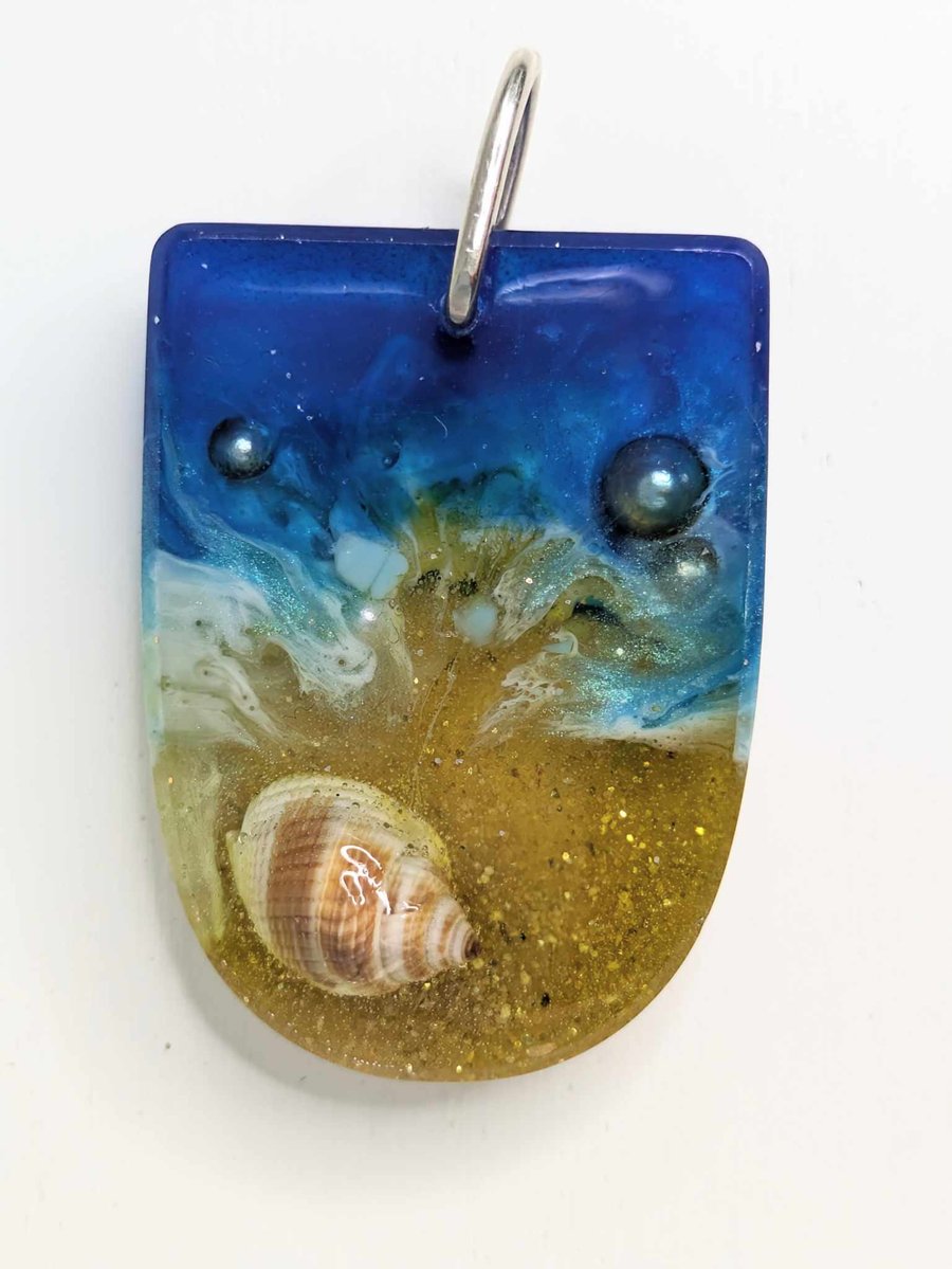 Beach Resin Pendant With Protruding Shell
