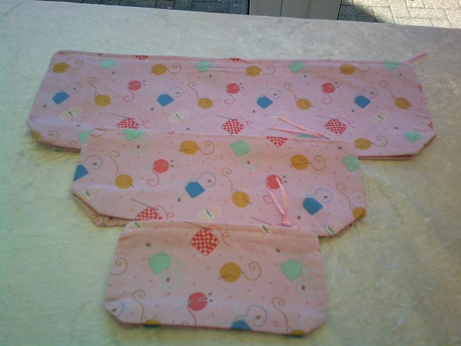 Set of 3 Zip Top Pouches with Crochet and Knitting on a Pale Pink Background