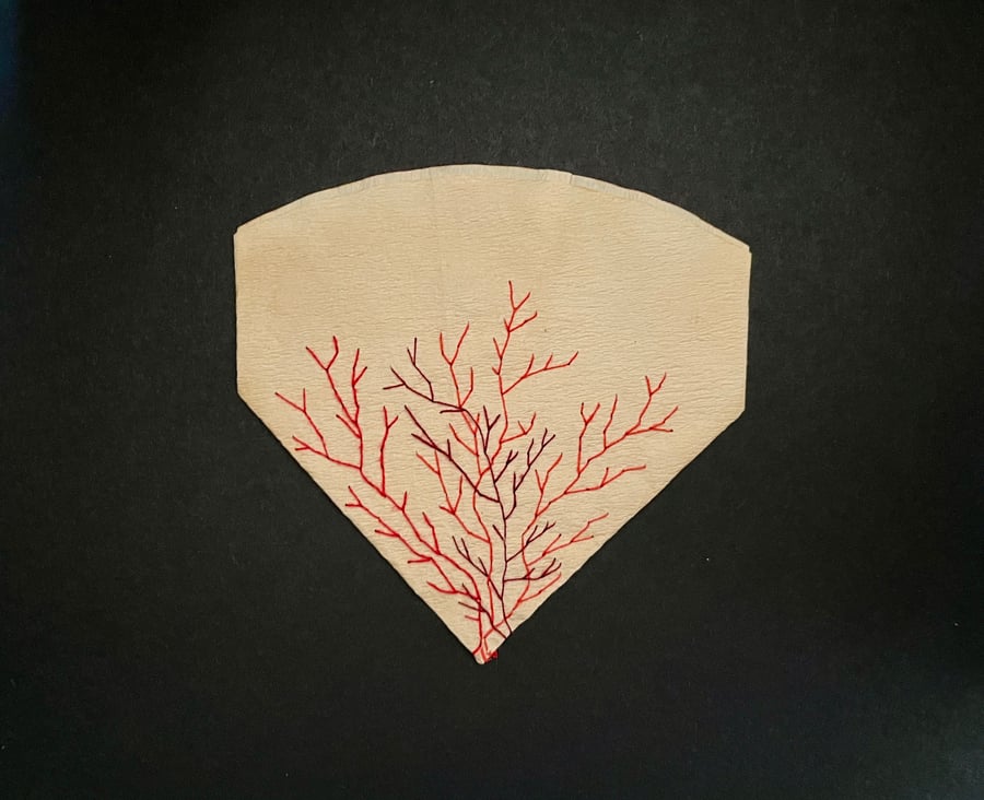 Hand stitched upcycled coffee filter embroidery art