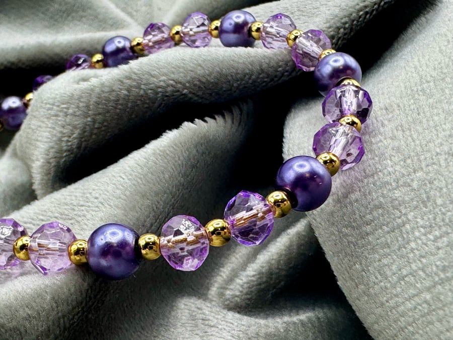 Amethyst coloured glass pearl and bead bracelet