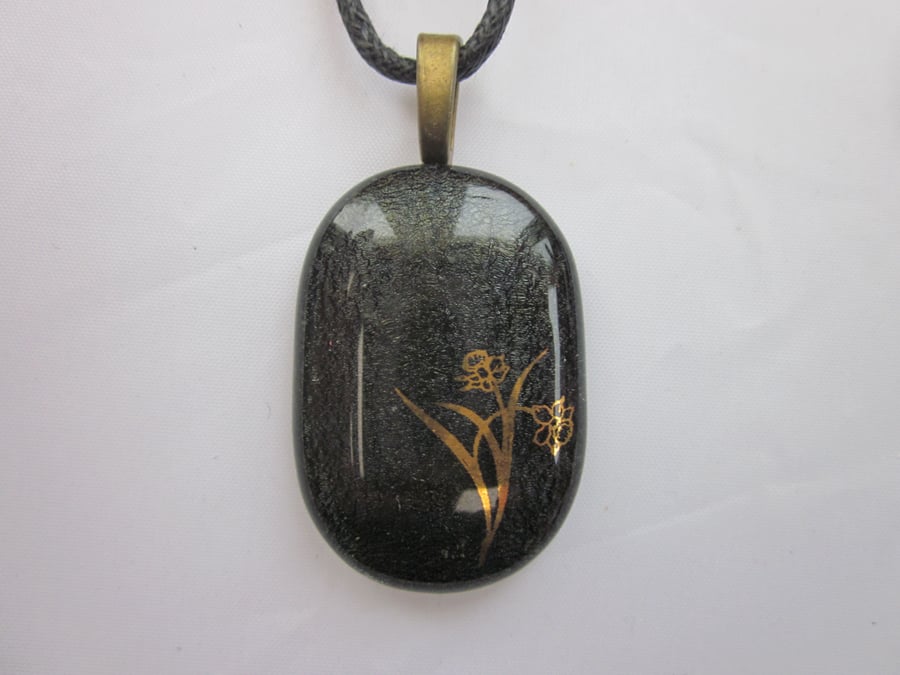 Handmade dichroic glass cabochon pendant - steel with gold daffodils