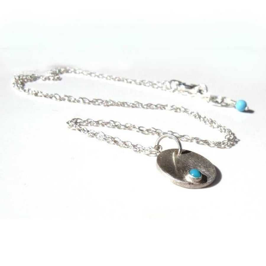 Something blue, something new, Round silver pendant with a turquoise