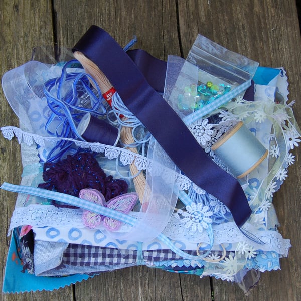 Upcycled slow stitching kit includes fabric, buttons, thread, lace, ribbon